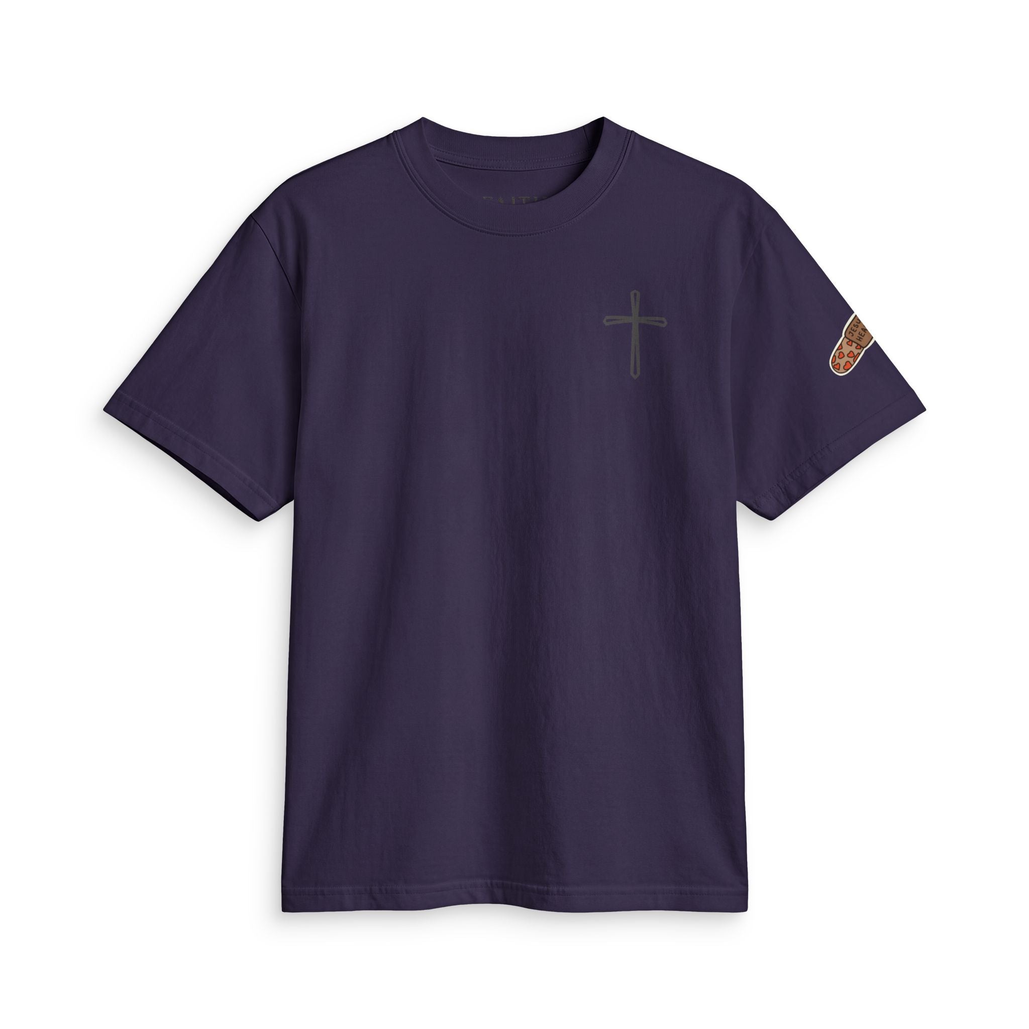 Minimal Cross Tee — Small Chest Cross & "Jesus Heals" Sleeve Patch