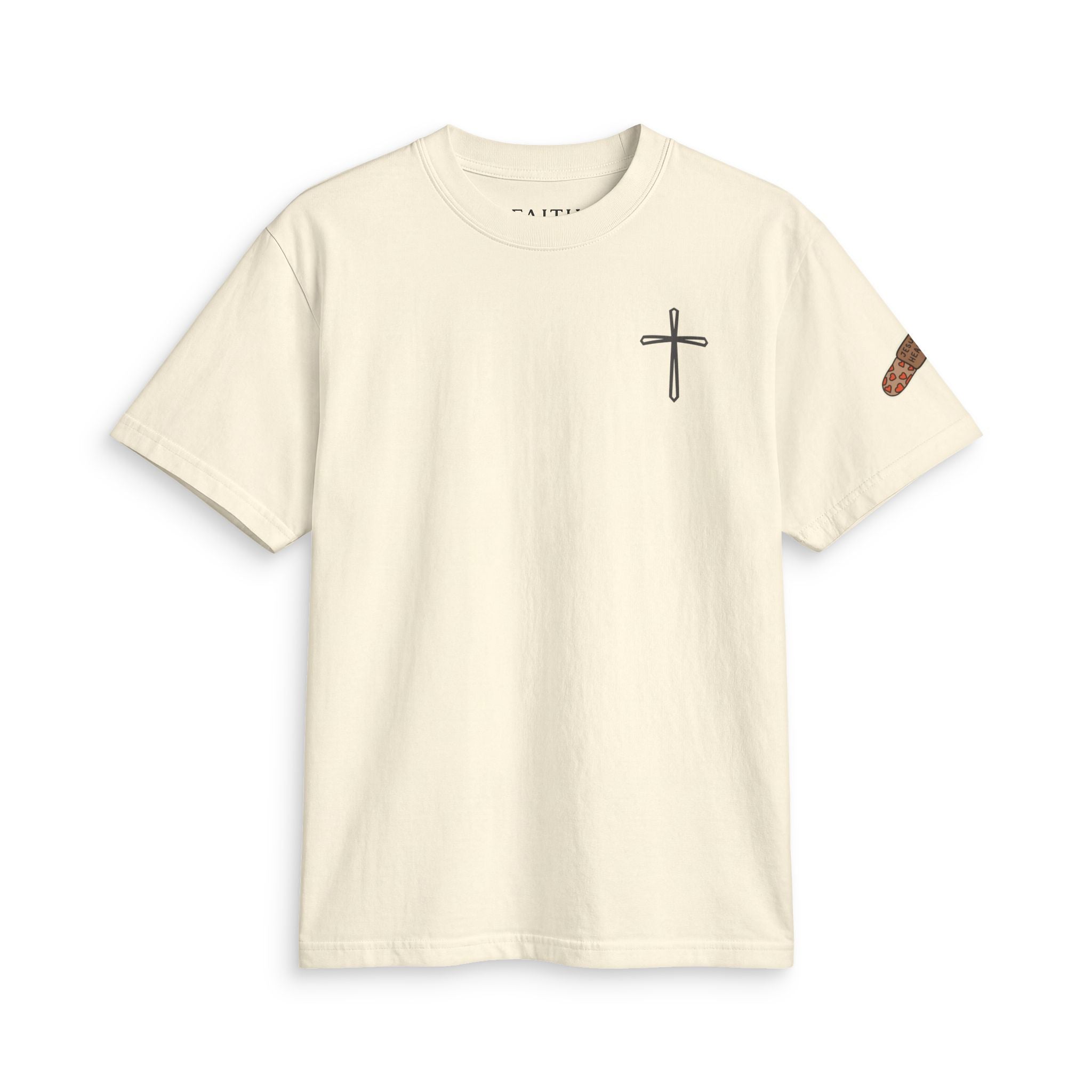 Minimal Cross Tee — Small Chest Cross & "Jesus Heals" Sleeve Patch