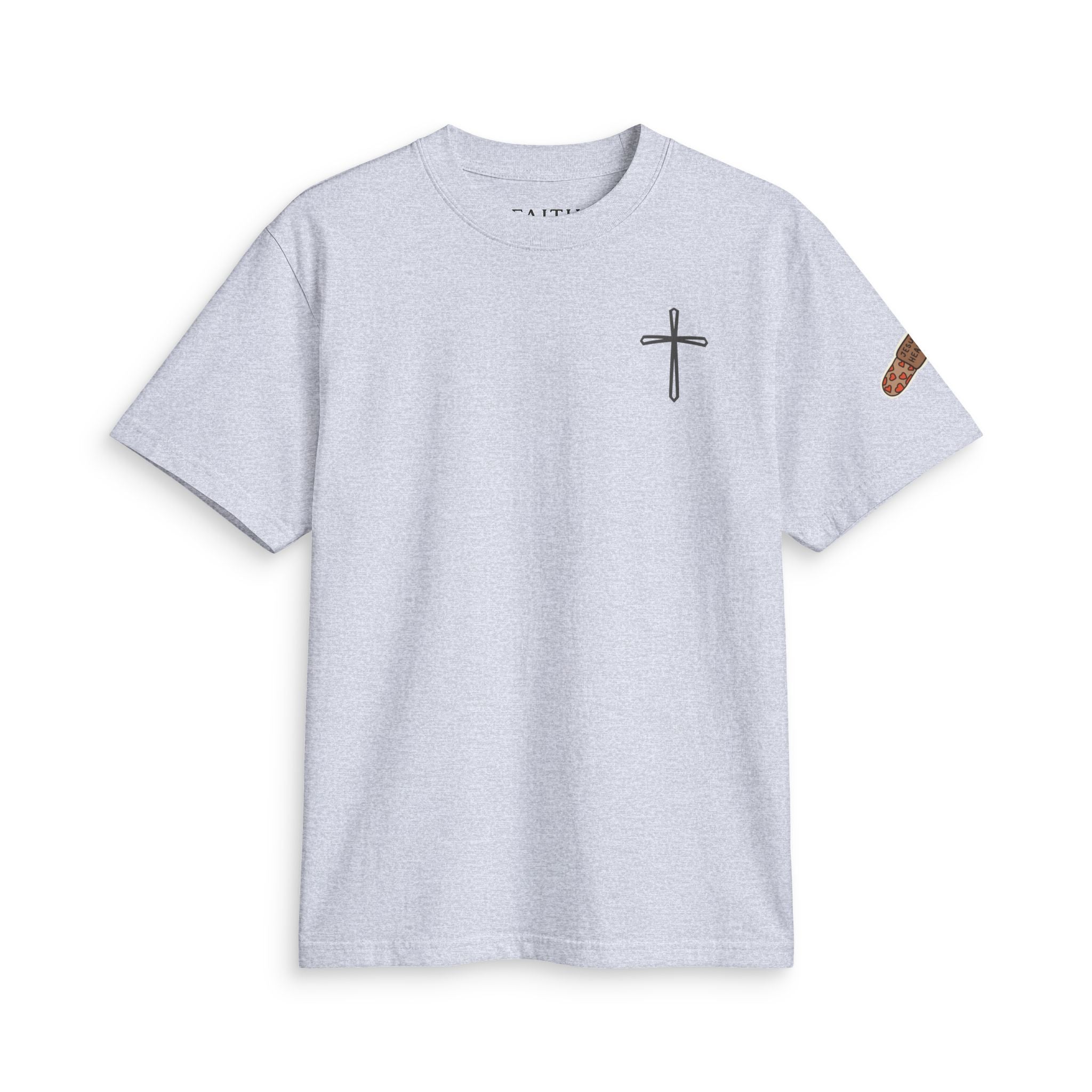 Minimal Cross Tee — Small Chest Cross & "Jesus Heals" Sleeve Patch